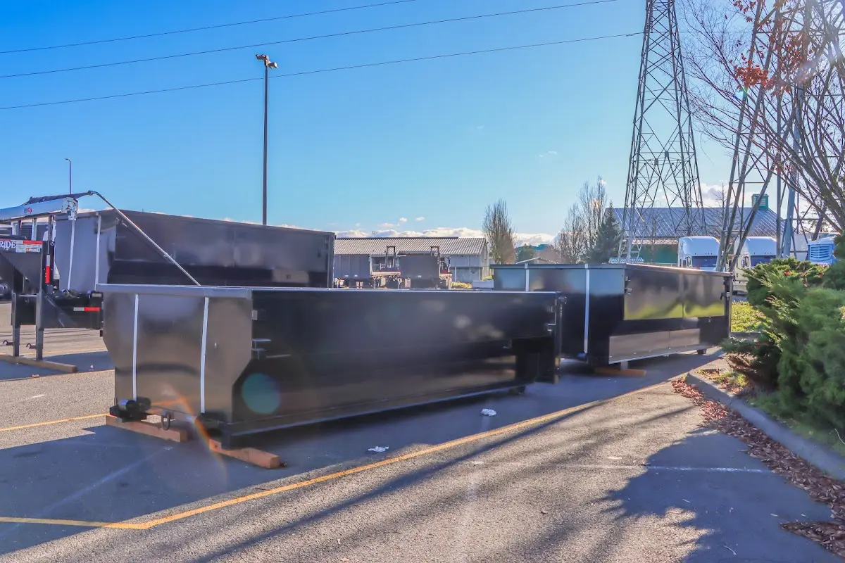 Roll-off dumpster ready for waste disposal at job site for 6 Yard Dumpster Rental in Griffin